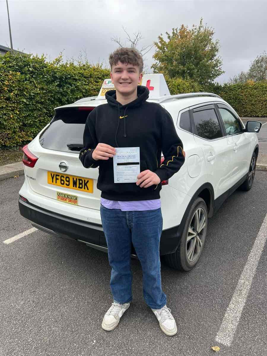 Student celebrating a driving test pass with LPD Driving School