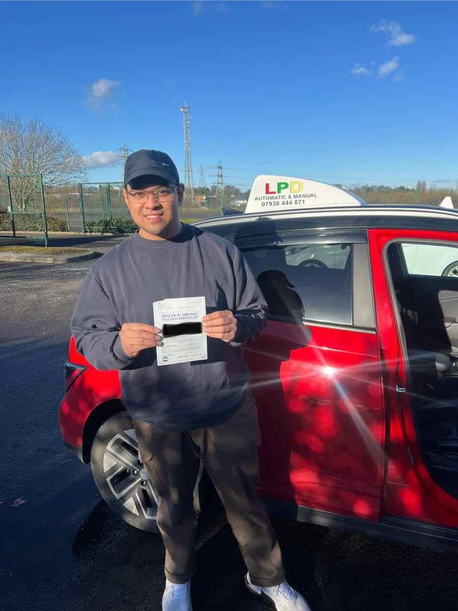 Student celebrating a driving test pass with LPD Driving School