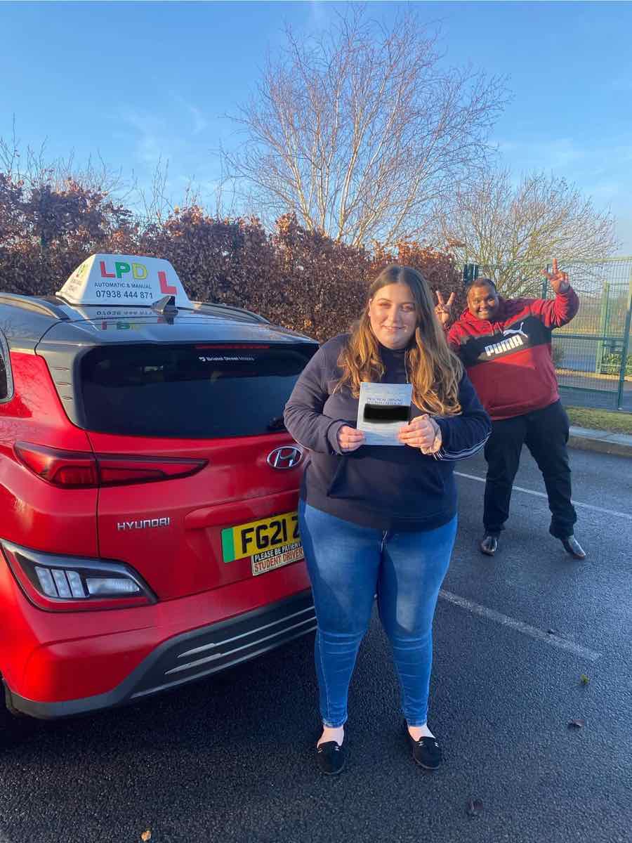 Student celebrating a driving test pass with LPD Driving School