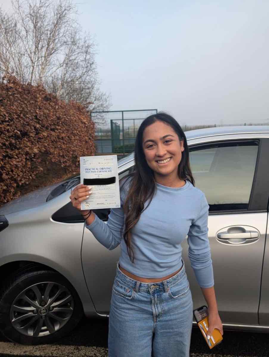 Student celebrating a driving test pass with LPD Driving School