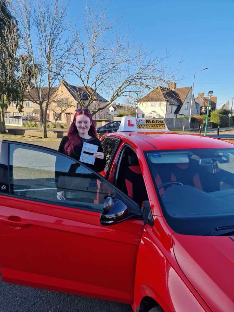 Student celebrating a driving test pass with LPD Driving School