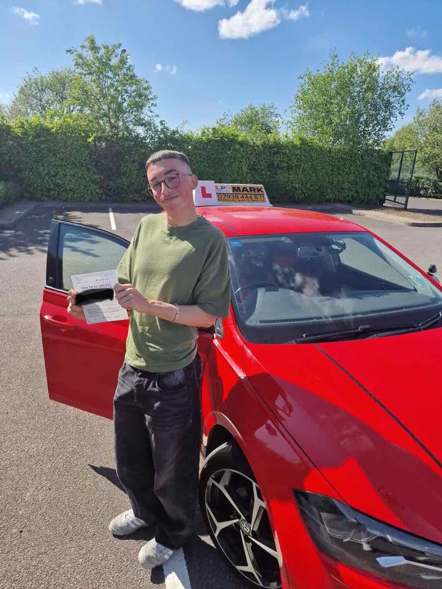 Student celebrating a driving test pass with LPD Driving School