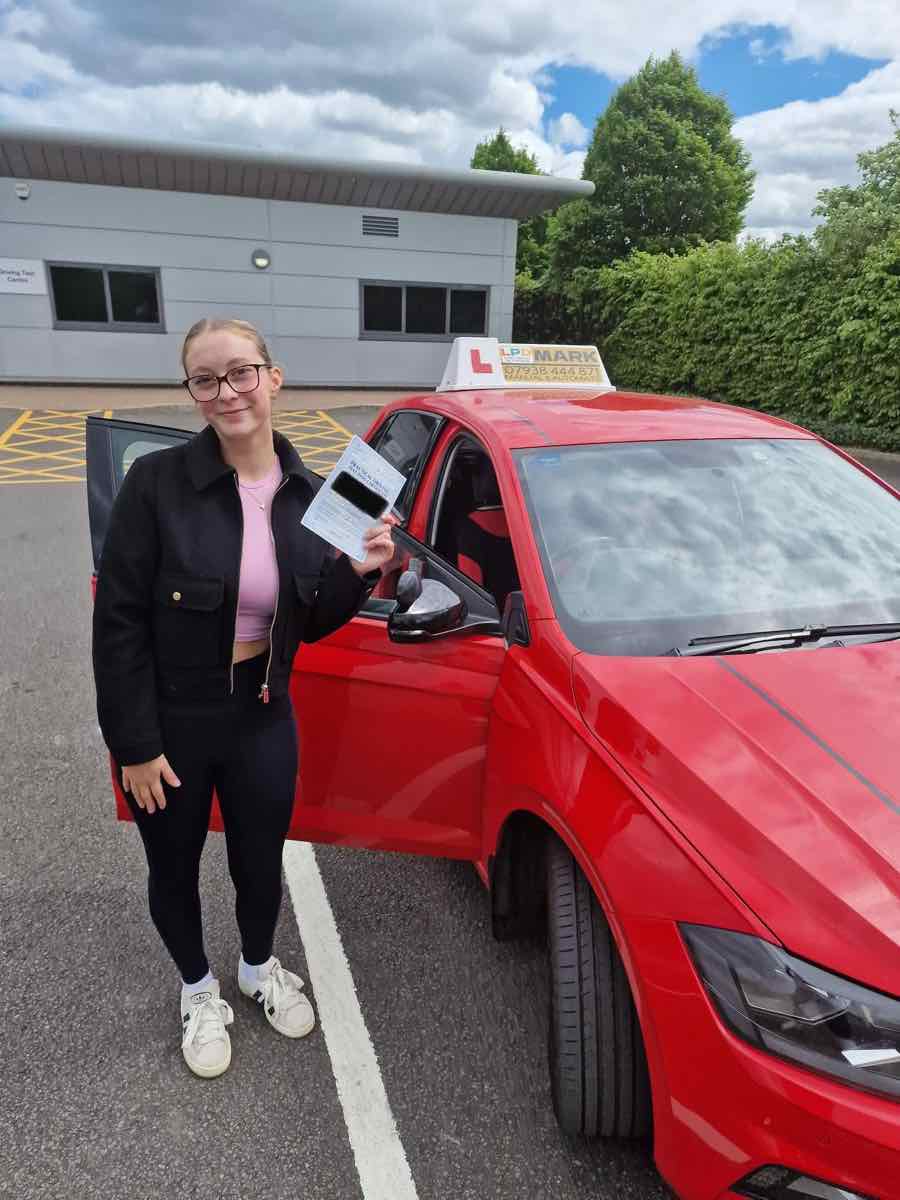 Student celebrating a driving test pass with LPD Driving School