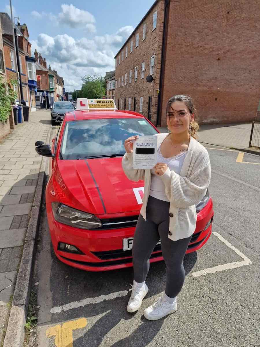 Student celebrating a driving test pass with LPD Driving School