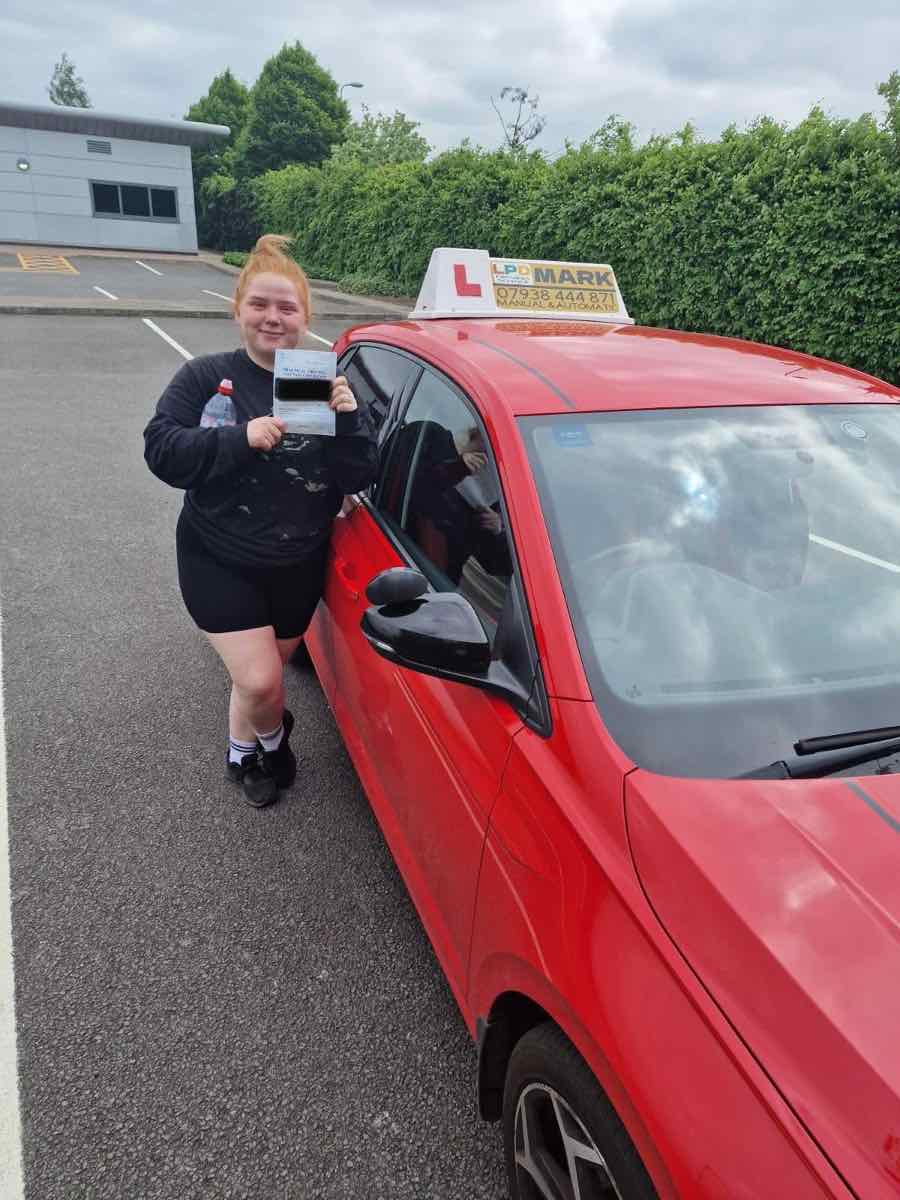Student celebrating a driving test pass with LPD Driving School