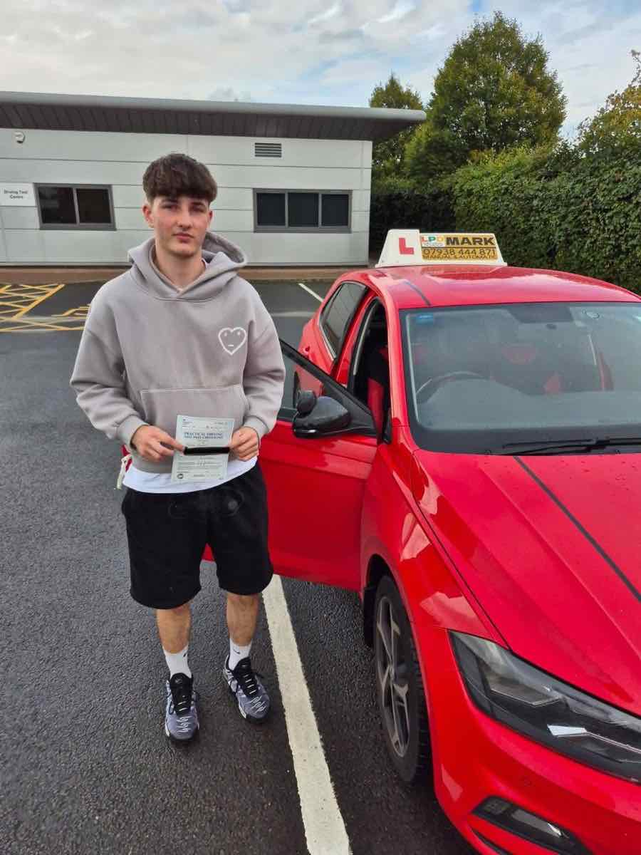 Student celebrating a driving test pass with LPD Driving School