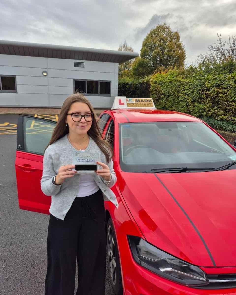Student celebrating a driving test pass with LPD Driving School