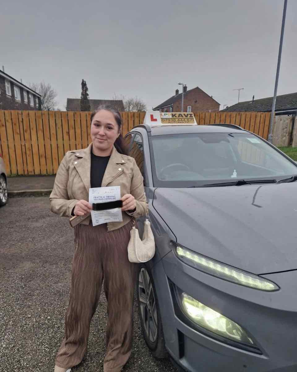 Student celebrating a driving test pass with LPD Driving School