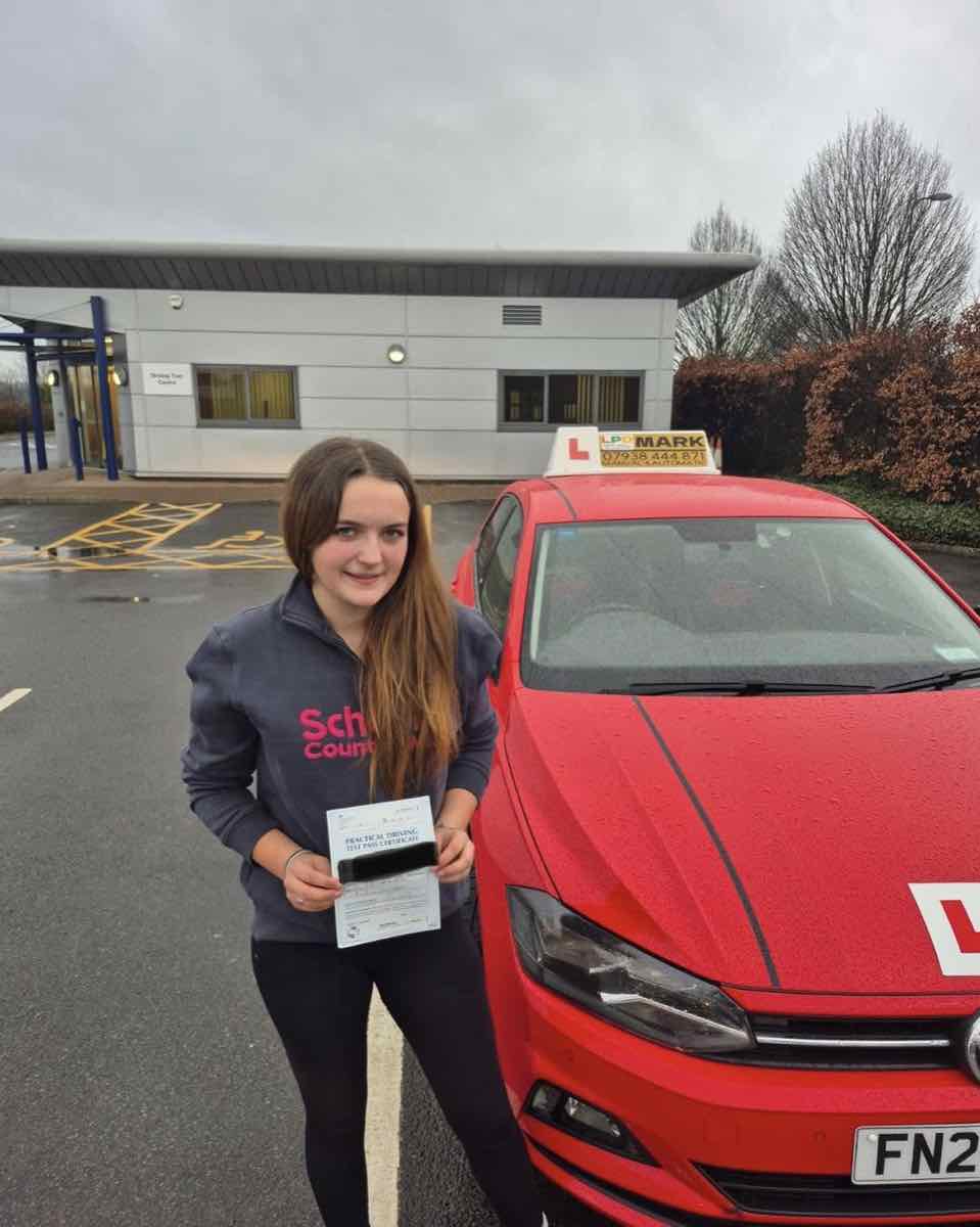 Student celebrating a driving test pass with LPD Driving School