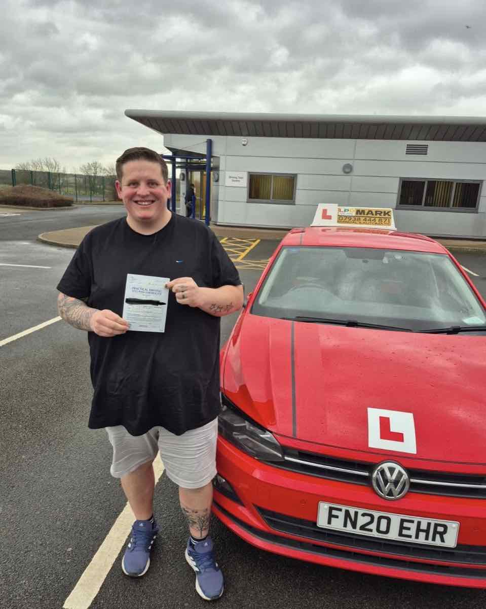 Student celebrating a driving test pass with LPD Driving School