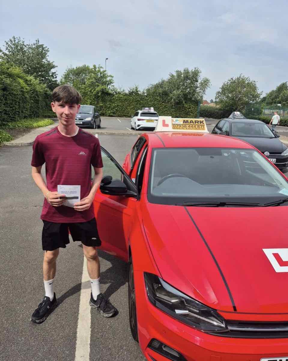 Student celebrating a driving test pass with LPD Driving School